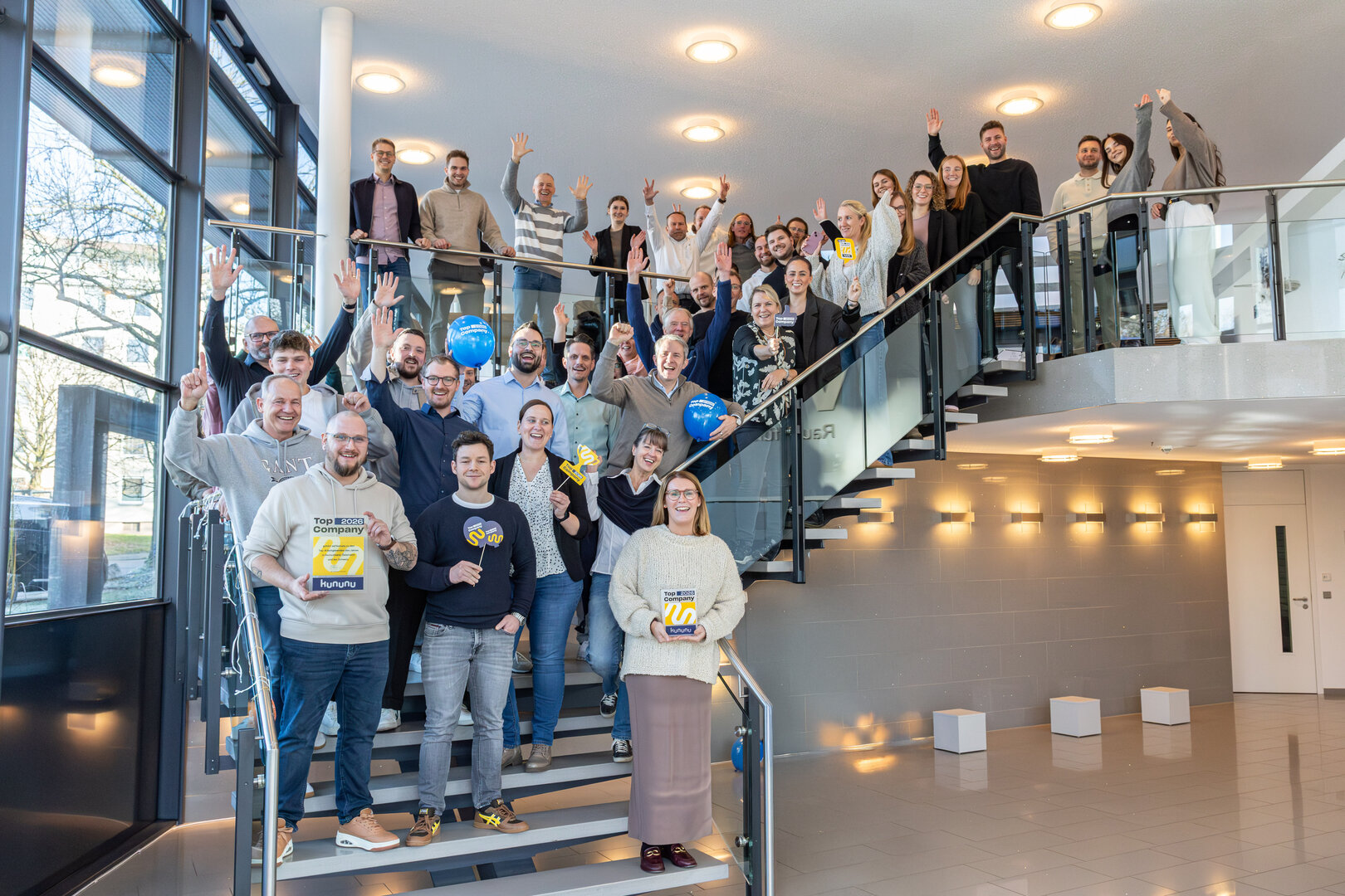Gemeinsamer Jubel zur Auszeichnung als Top Company 2026 von kununu